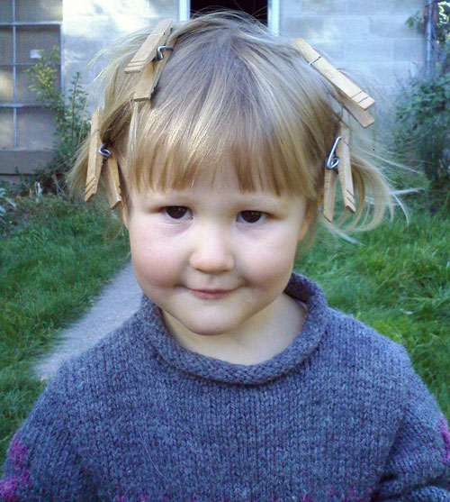child giving finger